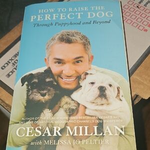 's 'How to Raise the Perfect Dog' Book - Blue Cover